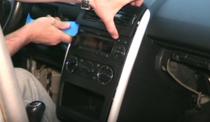Remove the air vent with a plastic removal tool