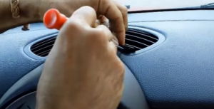 Remove two tabs in the air conditioning vent above the dash