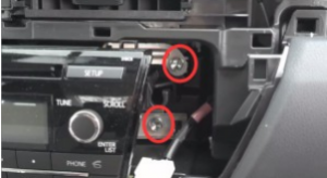 Remove two 10mm bolts marked in red as the picture shows. Then do the same on the left side