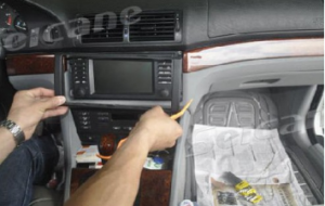 Use a plastic trim tool to remove trim strip