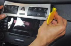 Remove the heated seat and control panel assembly