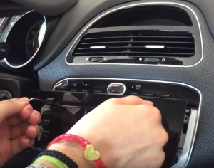 Pull outwards to release the car radio