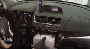 Gently take the original car radio out of the dashboard and disconnect the connectors at the back of it