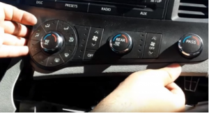 Remove the a/c control unit with your hands
