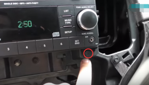 Use seven millimeter screwdriver to remove four screws that fix the original car radio