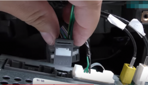 Remove connectors at the back of the original car radio