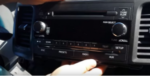 Take the factory radio out of the dashboard