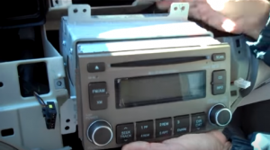 Take out the original car radio gently