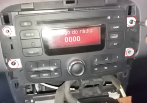 Remove four screws that fixed the radio on the dashboard