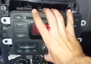 Softly take out the original car radio and disconnect connectors behind