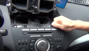 Remove the original car radio out from the dashboard
