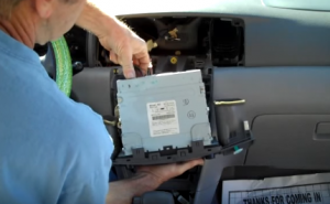 Disconnect connectors and cables at the back of the radio