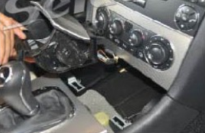 Remove the car charger and ashtray assembly