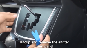 Unclip and remove the shifter trim panel