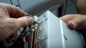 Disconnect the connectors and cables at the back of the radio