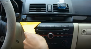 Remove the trim panel with a plastic removal tool