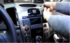 Gently take the original car radio out of the dash