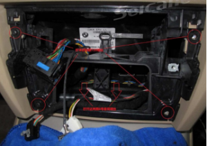 Take off the plastic bracket frame behind the CD player. Six screws are shown in the picture as follow. 4 of them are T20 screws, 2 of them are turnbuckles (no.8)