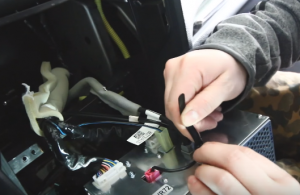 Disconnect the connectors and cables at the back of the original car radio