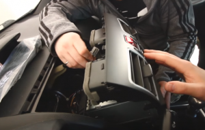 Make the connector plug to the back of the trim panel of the new car radio