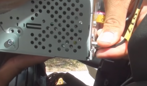 Disconnect the smaller harness on the behind of the original car radio
