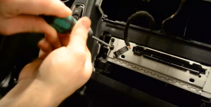 Use a screwdriver to remove the screws of the radio and then pull out the original car radio