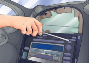 2.Remove screws that fixed the radio on the dashboard.