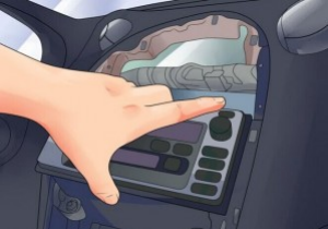 3.Pull the factory radio out of the dash with medium force, as the wires are connected to.